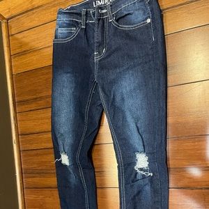 Blue jeans with rips